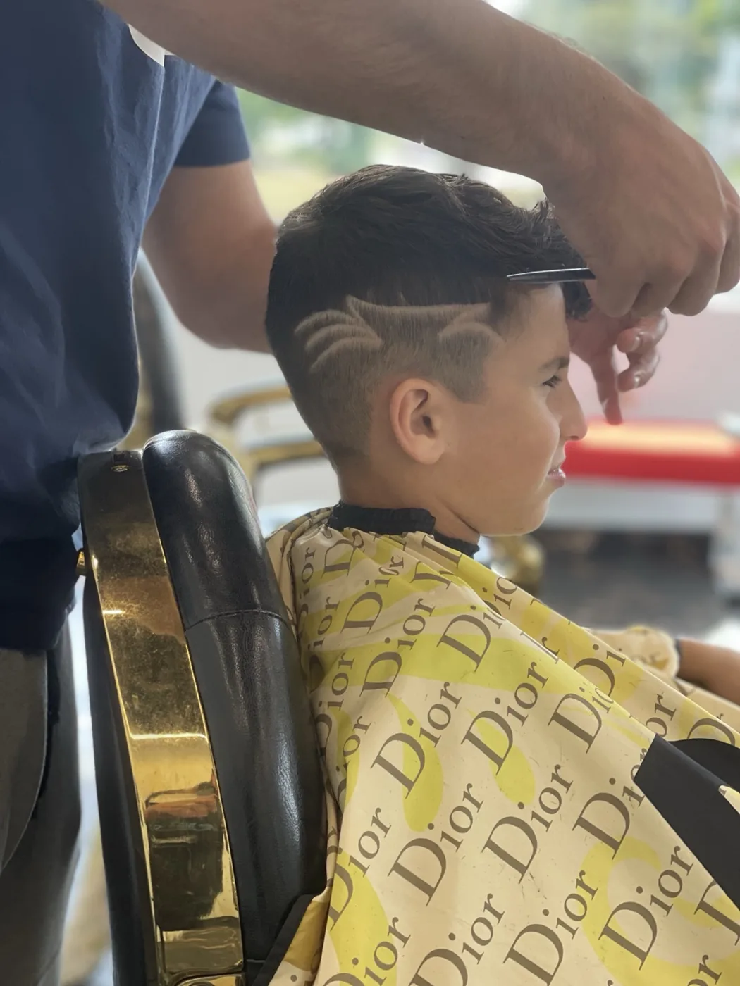 Mid fade with shaved hair design