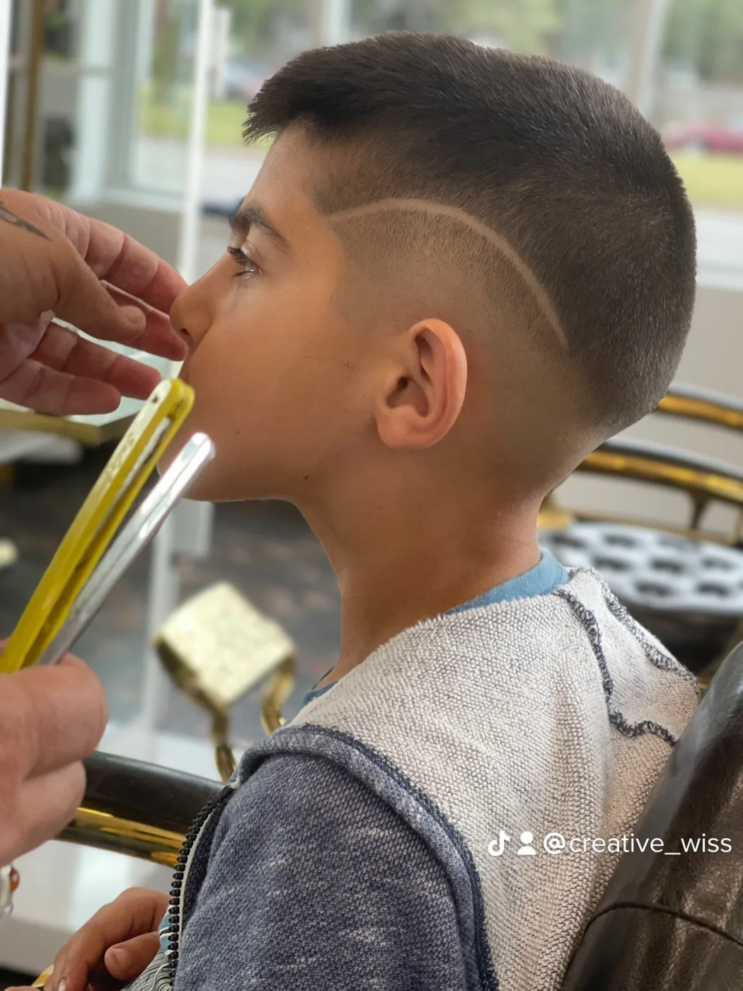 Mid skin fade with clean curved hair design